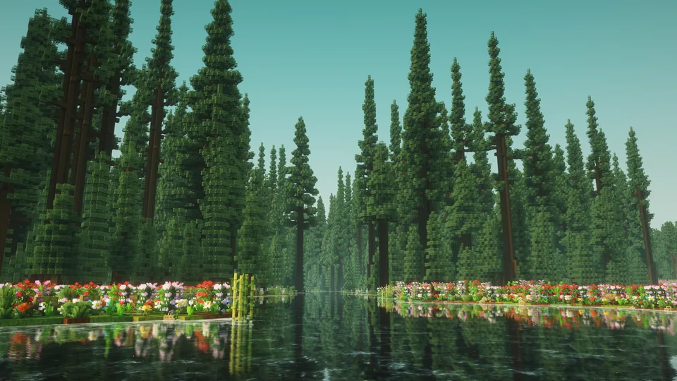 Tall conifers mirrored in a quiet lake edged with colourful flowers