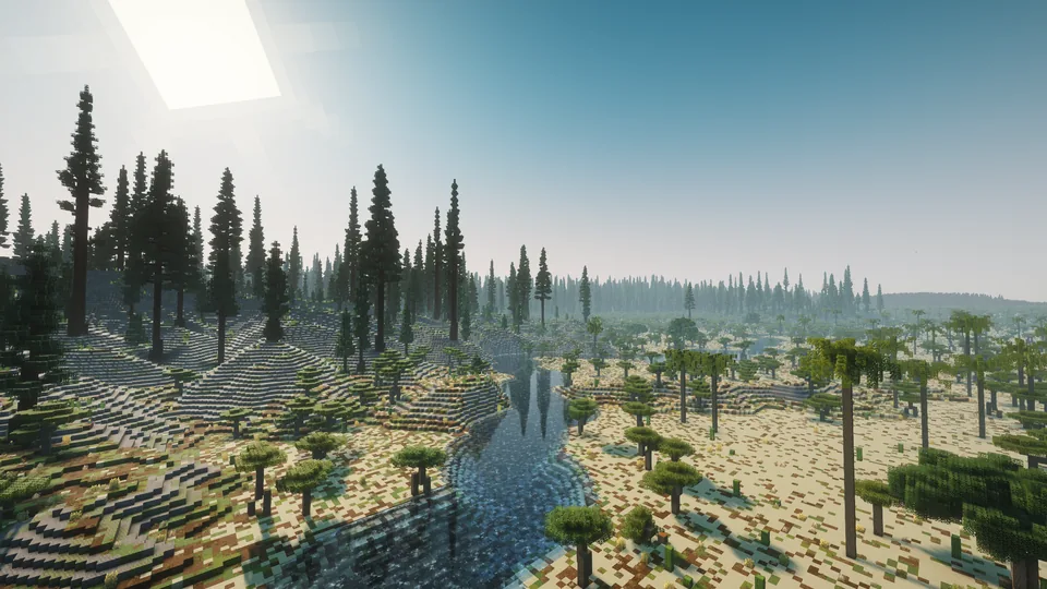 A river winding through pale open plains with scattered tall conifers
